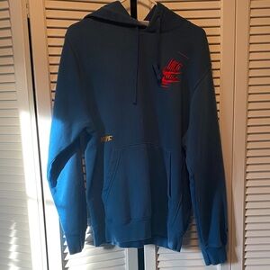 Nike Essential+ Glitch Blue Hoodie with Red and Yellow Accents size Small